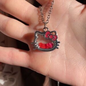 Hello kitty Sanrio necklace clear pink and silver with reflective hearts inside